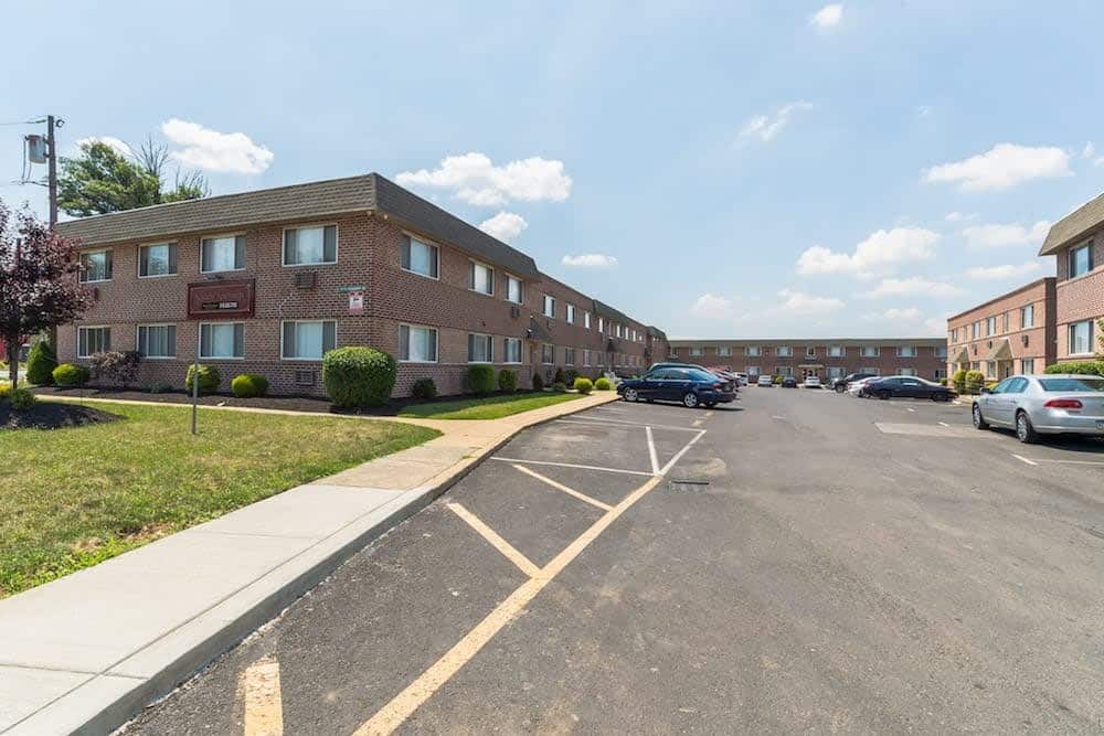 Traditional Philadelphia rowhome buildings commonly used as rental apartments.